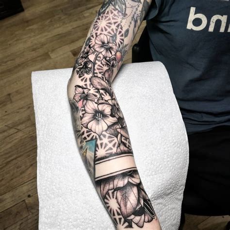 Floral motifs in tattoo sleeve filler designs