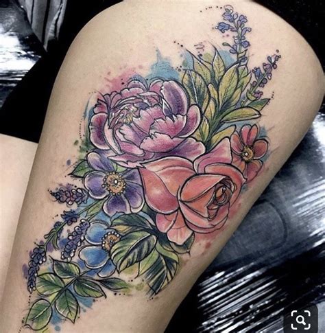 Floral thigh tattoo design