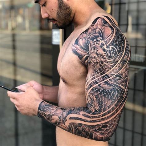 Full sleeve tattoos on arm