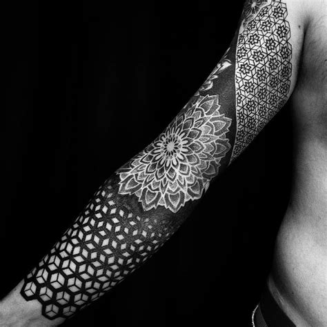 Geometric pattern tattoo on the thigh