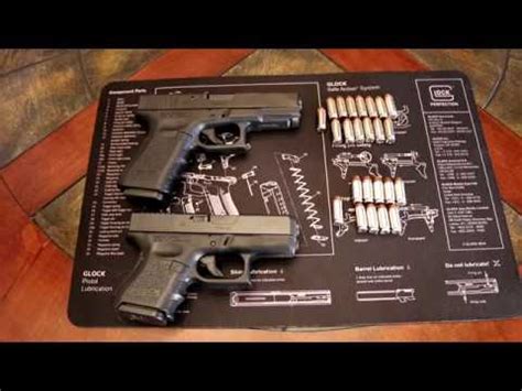 Glock 23 vs Glock 27 concealability comparison