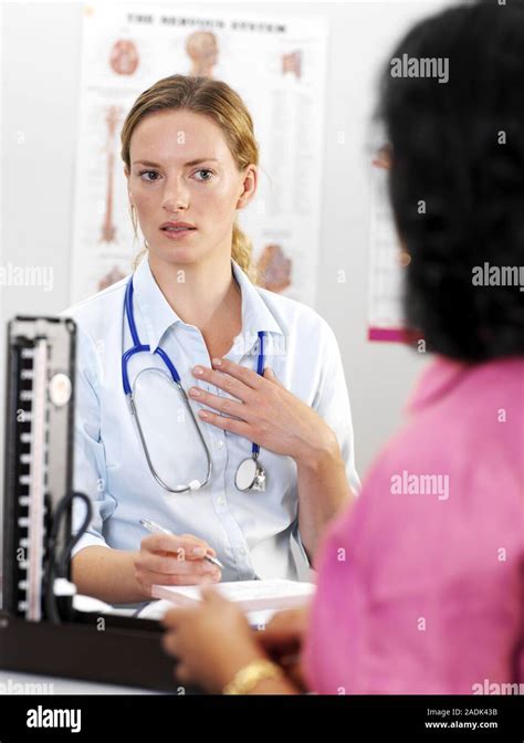 General Practitioner Discussing with Patient