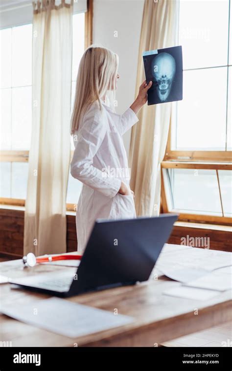 General Practitioner Looking at X-Ray