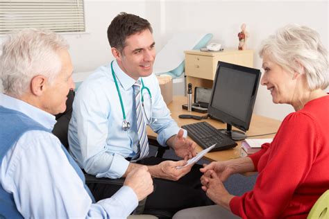 General Practitioner Talking to Patient