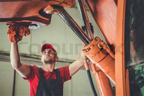 Heavy Equipment Mechanic at Work