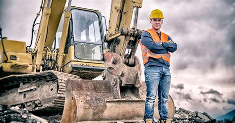 Heavy equipment operator operating equipment at night