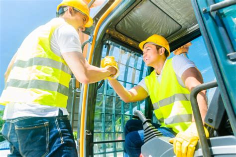 Heavy equipment operator operating a telehandler