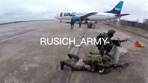 Ukrainian soldiers celebrating their victory at Hostomel Airport