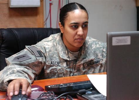 A human resources specialist working at a desk