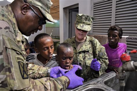 Army Reserve nurses providing medical care during a humanitarian mission