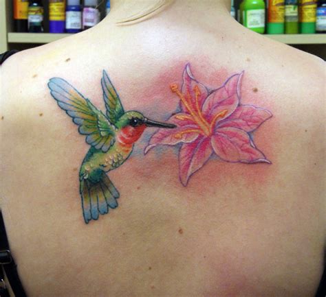 Hummingbird and flower tattoo art