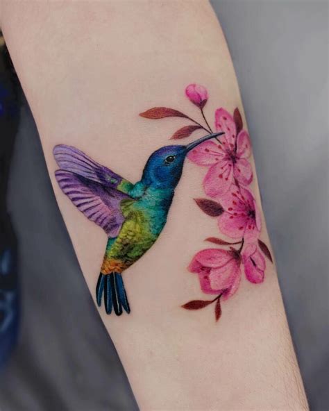 Hummingbird and flower tattoo design