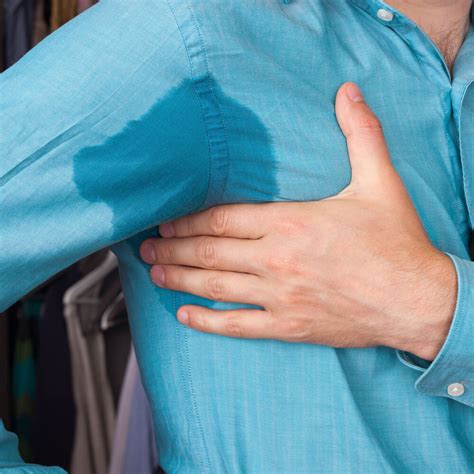 A person experiencing excessive sweating