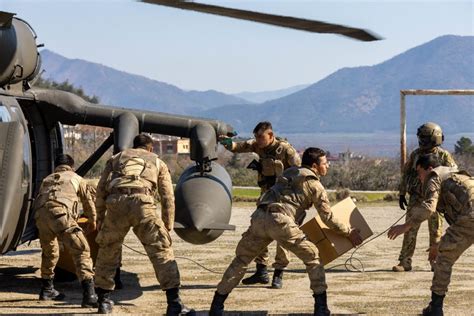 Infantry soldiers providing humanitarian aid