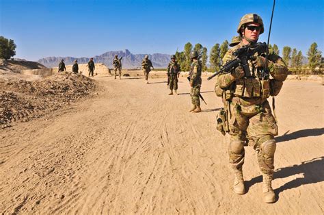 Infantry patrols in a desert terrain