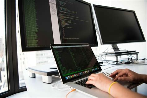 National Guard Information Technology Specialist working at a computer