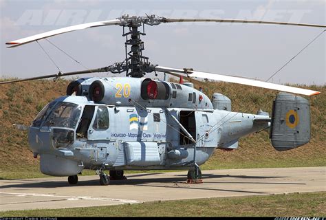 Kamov Ka-27 helicopter flying over a ship