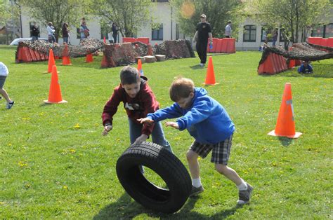 Kids participating in outdoor activities at boot camp