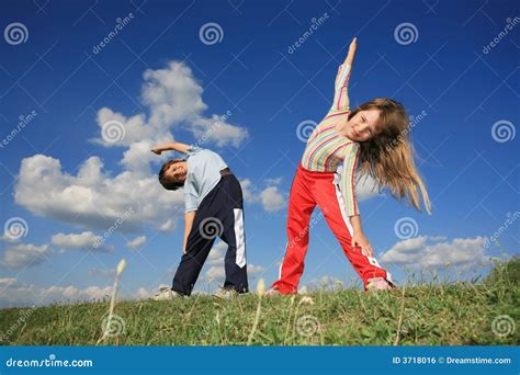 Kids exercising outdoors in a bootcamp program