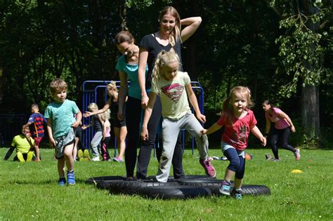 Kids learning about teamwork in a boot camp