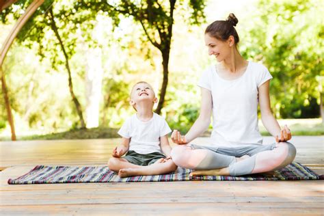 Kids practicing meditation in a boot camp