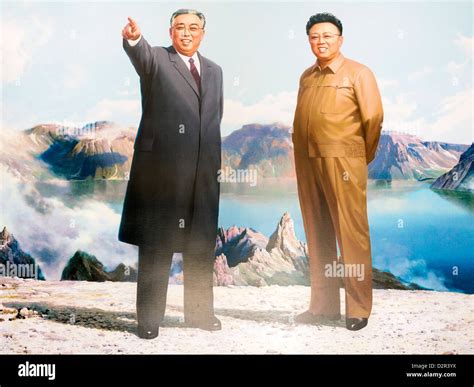 Kim Jong Un with Kim Il-sung and Kim Jong-il