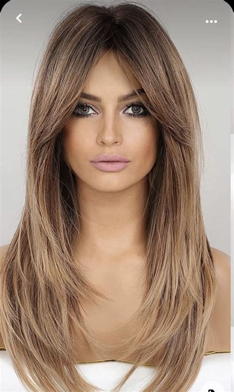 Layers with center part haircut