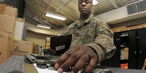 A logistics specialist working in a warehouse