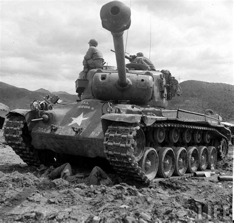 M1 Pershing tank crew in action