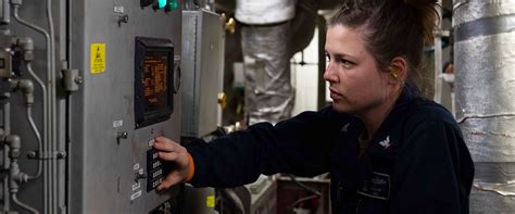 Machinist Mate at work in the engine room