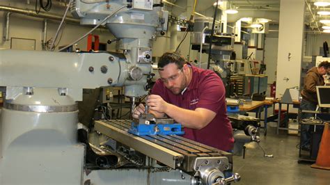 Machinist Mate at work in the engine room