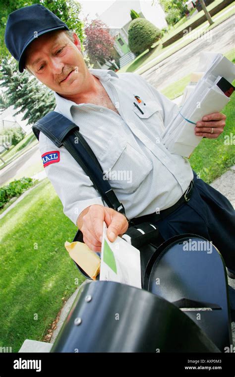 Mail Carrier Delivering Mail