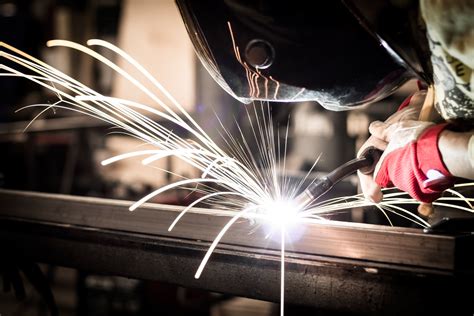 Welder working in a manufacturing plant