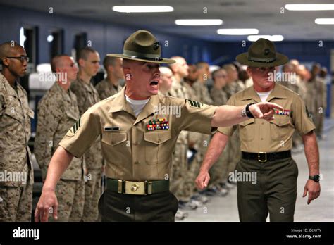 Marine Corps drill instructor yelling at recruits.