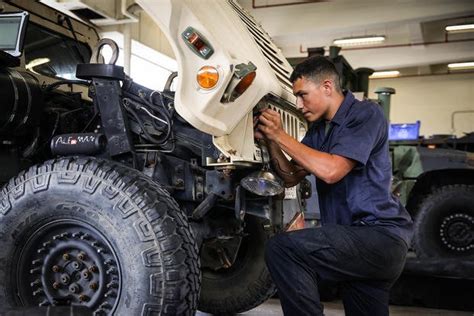 Marine Corps Mechanic receiving a promotion