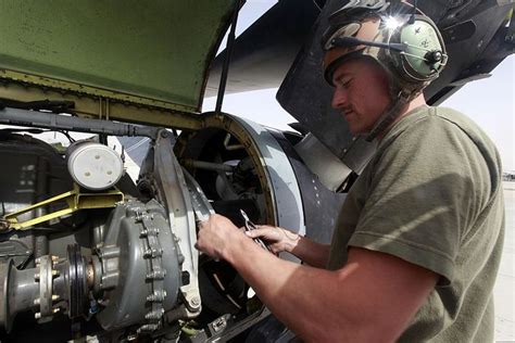 Marine Corps Mechanic working on a vehicle