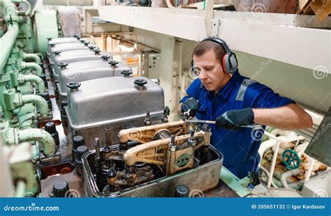 Marine Engineer Performing Maintenance Tasks