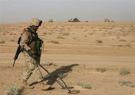 Marines from the 2d Combat Engineer Battalion conduct a route clearance exercise in a training environment.