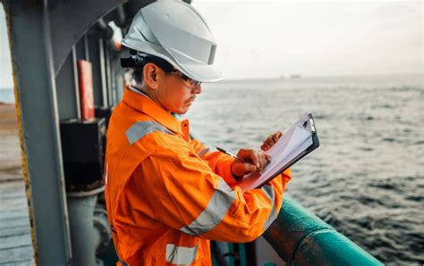 Marine Officer Inspecting Cargo