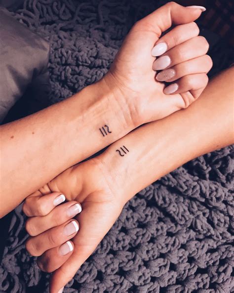 Matching symbols tattoos