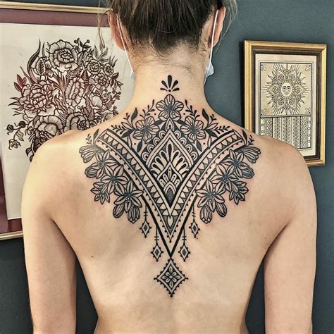 Meaningful back tattoo designs with deep symbolism