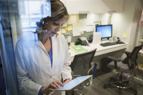 A medical research coordinator collecting data