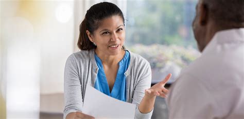 Mental health professional counseling a patient