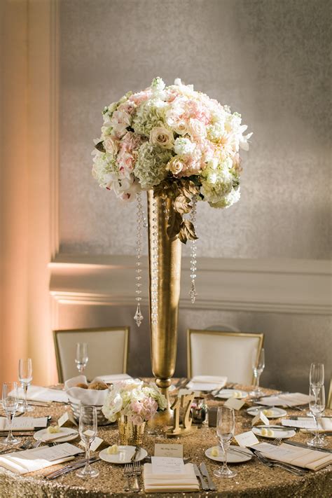 Metallic centerpiece with navy blue tablecloth