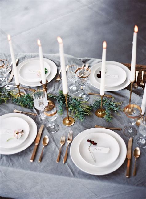 Metallic table setting with navy blue tablecloth