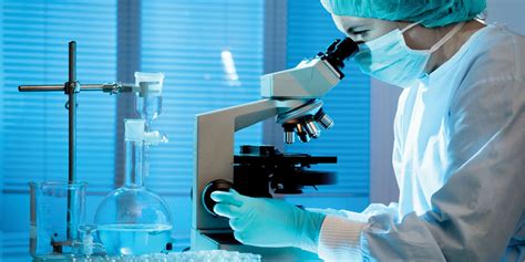 Microbiologist analyzing a sample in a laboratory