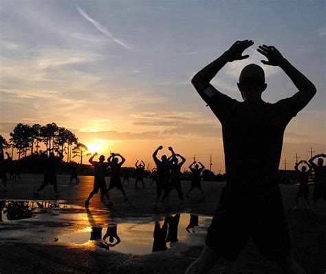 A group of military recruits participating in a bootcamp