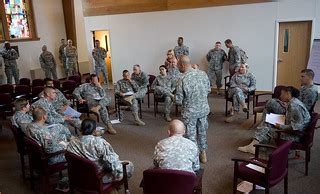 Military Chaplain talking to soldier