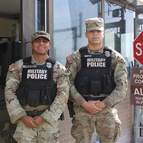 Military Cop Working with Community