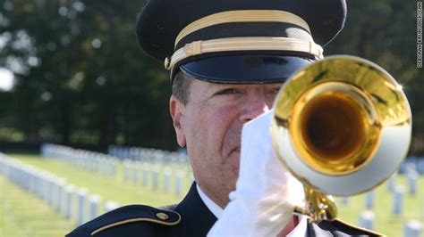 A bugler playing at a military funeral